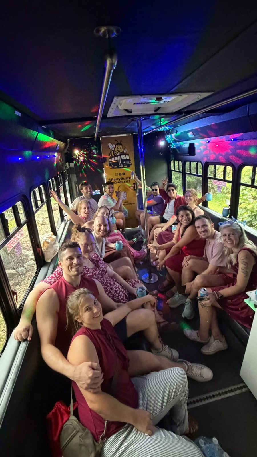 Friends enjoying a private group outing aboard the Party Buzzed bus